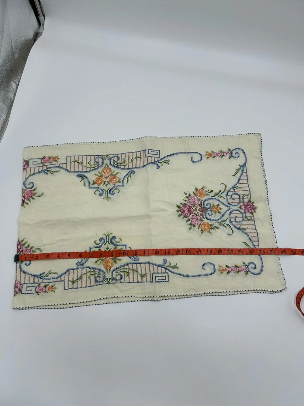 O/S hand stitched